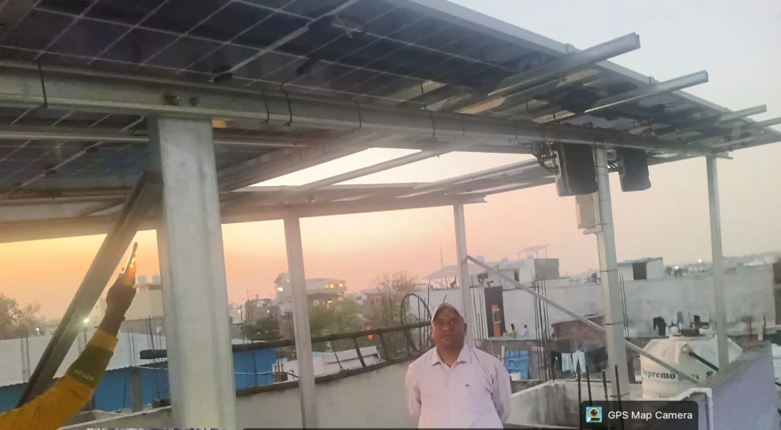Solar canopy over a rooftop terrace in Musakhedi, Indore, photographed at sunset